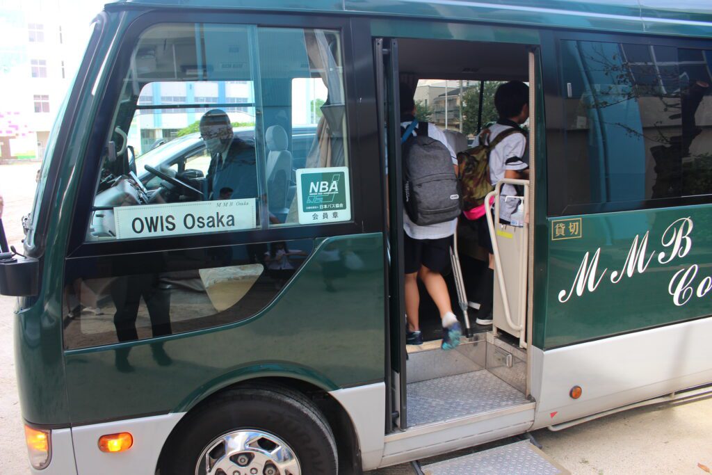OWIS Osaka School bus, with branding